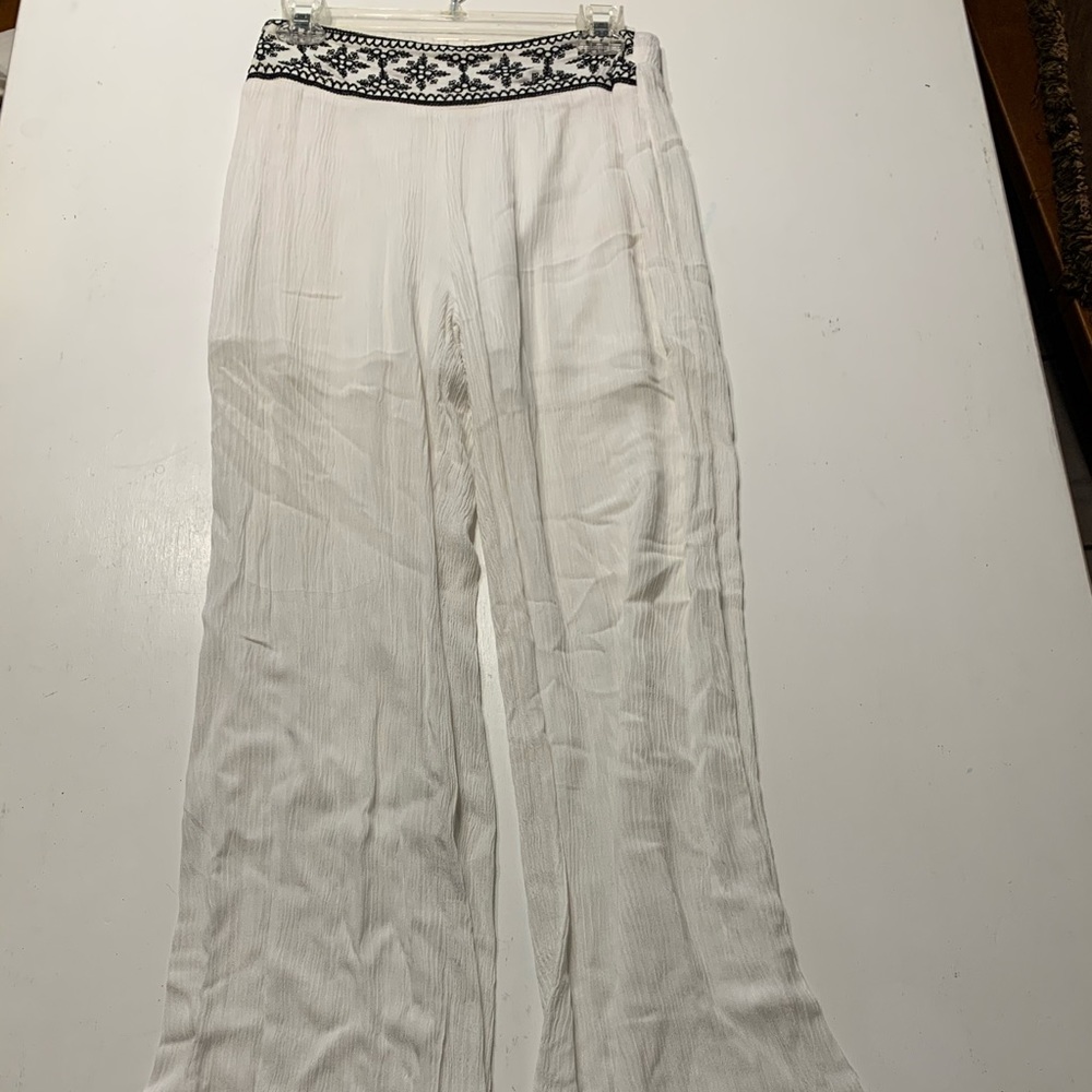 White linen boutique pants